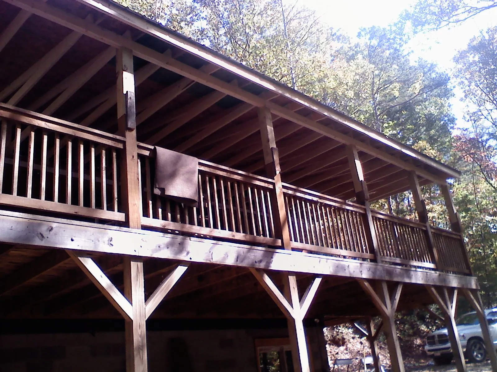 Timber framing under a new elevated porch and deck — Roof Leak Repair in Deferiet by Roofing Brothers